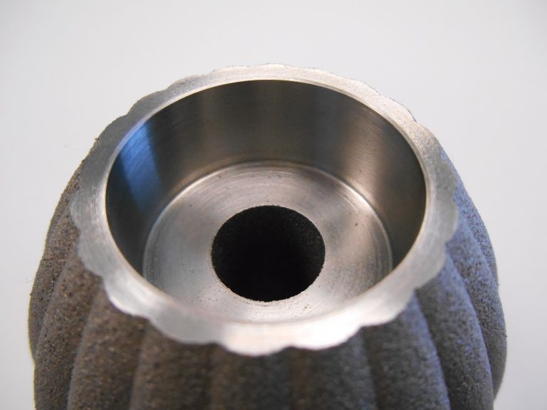 Additive manufacturing producing parts at speed and in quantity